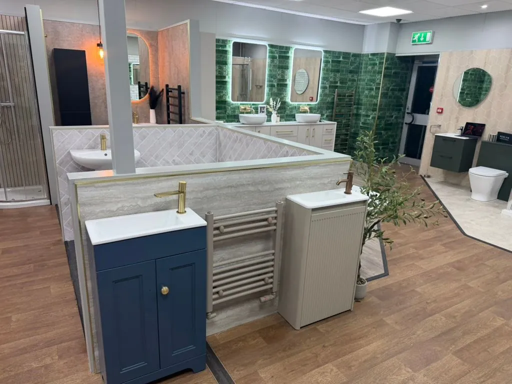 Commercial bathroom showroom refit with shower and vanity display bays by Warm-Wise