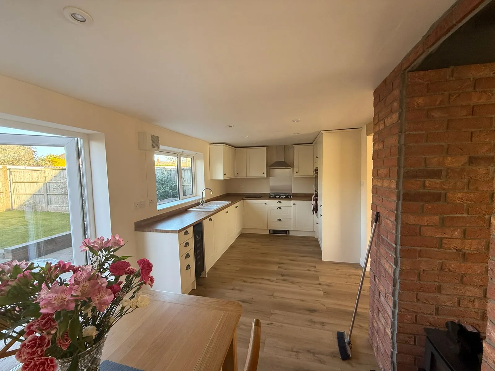 Full house renovation in Crewe with open-plan kitchen and multi-fuel stove by Warm-Wise