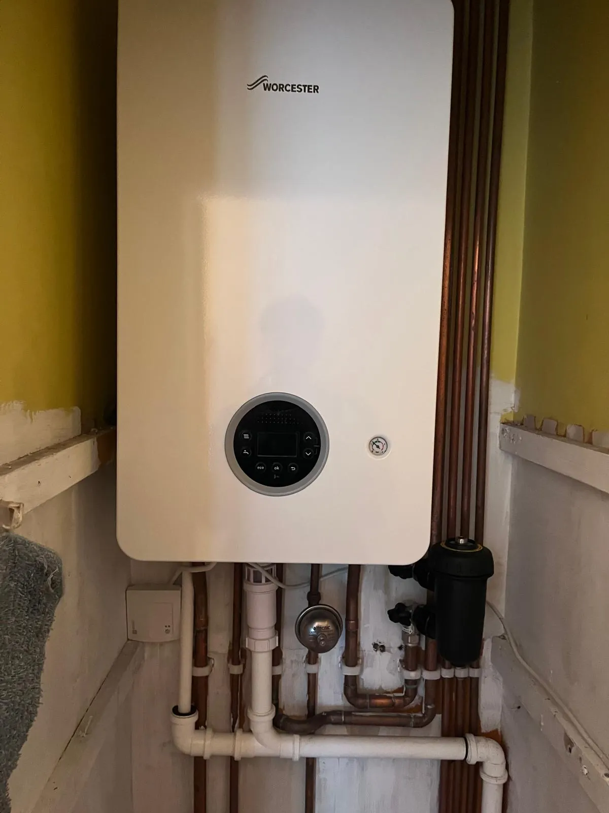 Gas Safe boiler installation with pipework and hot-water cylinder | view 3
