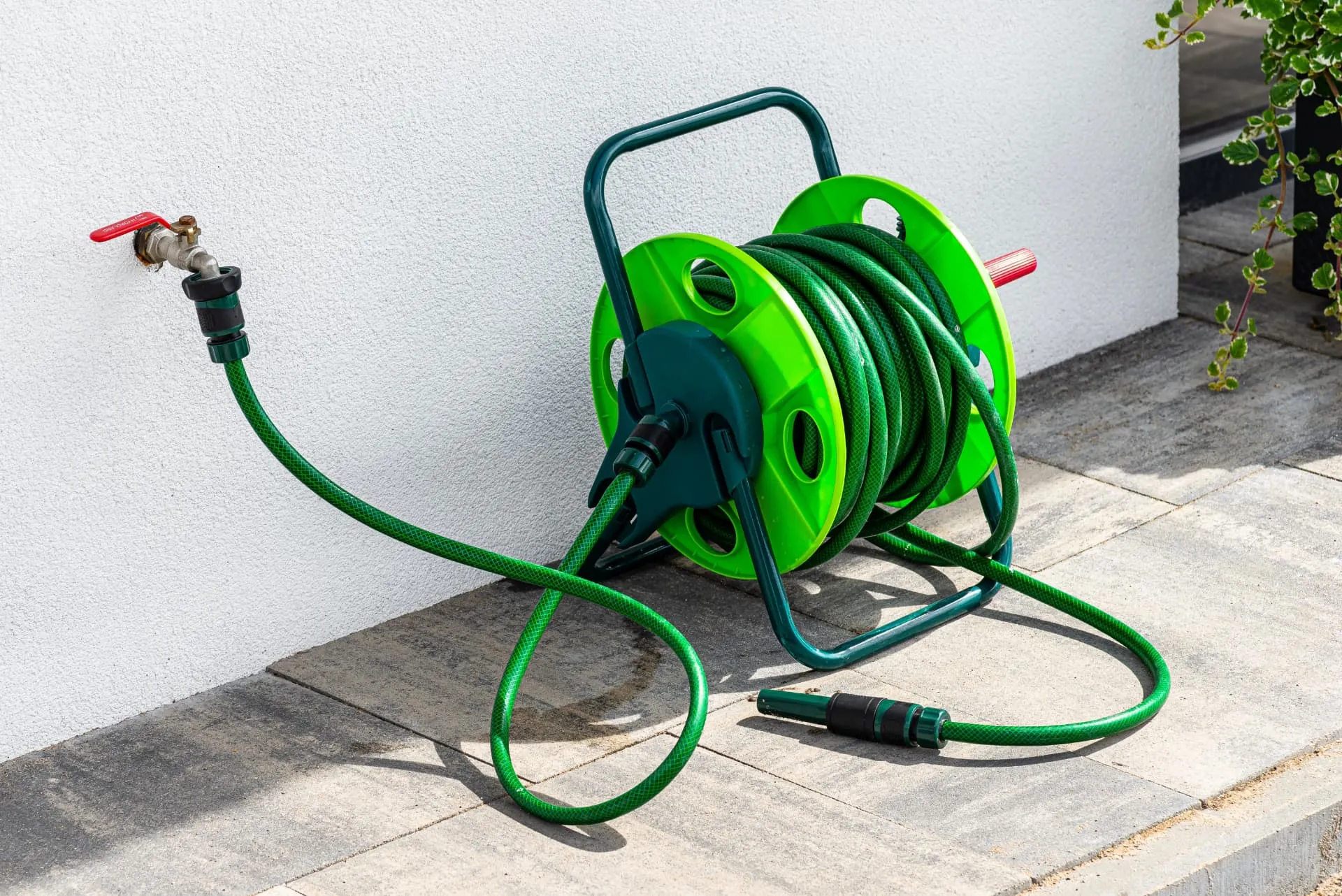 Outside tap with garden hose connected