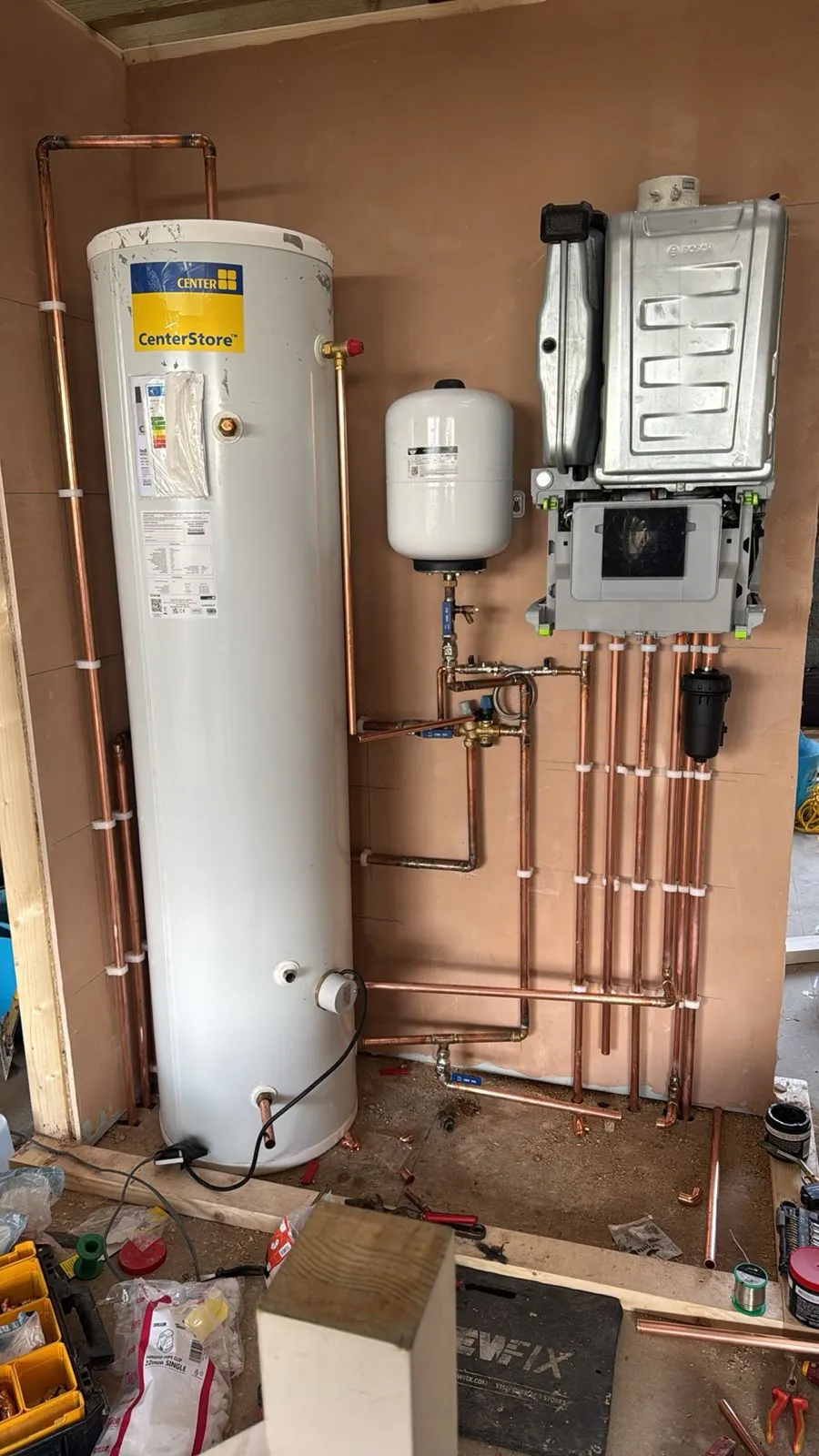 Gas Safe boiler installation with pipework and hot-water cylinder | view 4