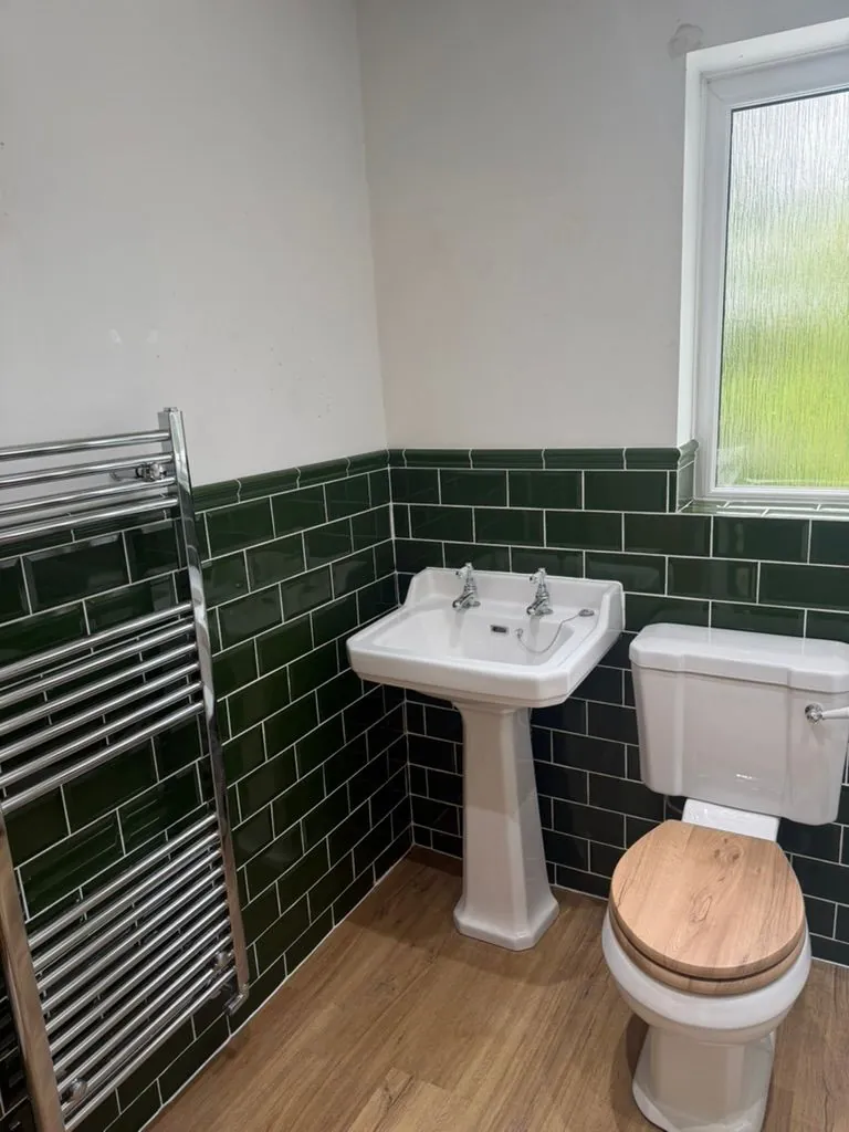 Traditional green-tiled bathroom refit in Nantwich by Warm-Wise